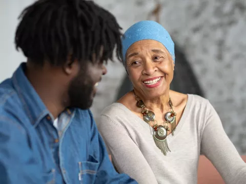 A smiling cancer survivor.