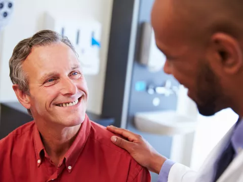 patient receiving a prostate cancer screening from a physician