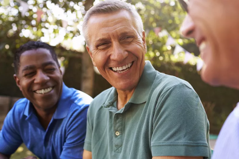 Men talking about health screenings.