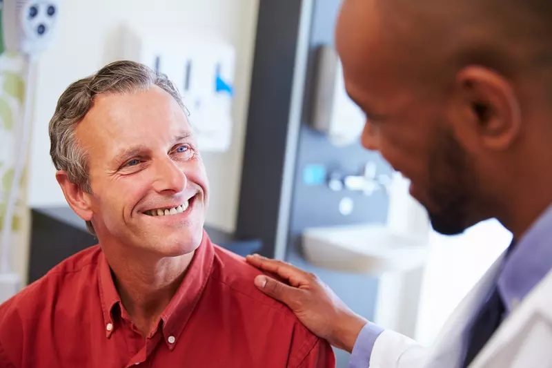 patient receiving a prostate cancer screening from a physician