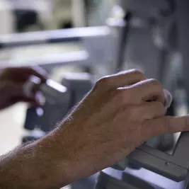 A person's hands holding equipment