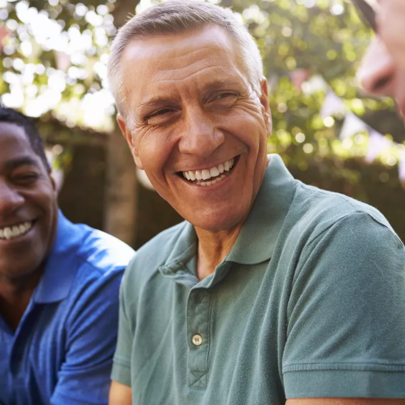 Men talking about health screenings.